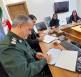 امضای تفاهم نامه در حوزه برنامه ها و اقدامات فرهنگی جهاد دانشگاهی و اداره کل حفظ آثارونشرارزشهای دفاع مقدس استان گیلان با حضور روسا و معاونین در سالن جلسات مرکز فرهنگی دفاع مقدس